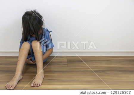 A depressed girl sitting in her room (Japanese, 5 years old) A depressed girl sitting in her room (Japanese, 5 years old) 129226507