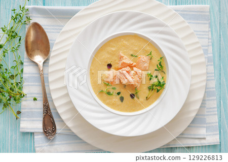 creamy salmon soup with herb in a bowl creamy salmon soup with herb in a bowl 129226813
