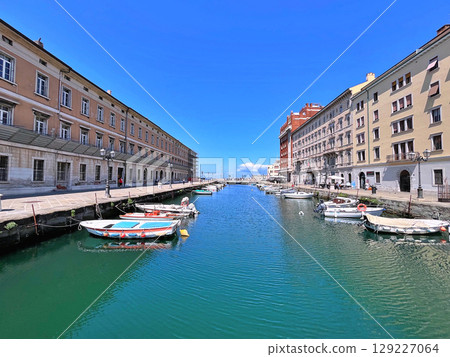 View on buildings near Canal Grande in Trieste, Italy. Trieste is a seaport in northeastern Italy 129227064