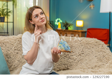 Pregnant woman counts euro cash planning baby birth budget serious money management preparation Pregnant woman counts euro cash planning baby birth budget serious money management preparation 129227190