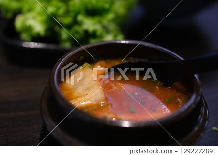 Hot soup with green lentil, chicken, vegetables and spices. Hot soup with green lentil, chicken, vegetables and spices. 129227289