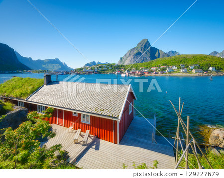 Nature in fjords. Reine, Lofoten islands, Norway. Traveling on a Norwegian fjord. Nature in fjords. Reine, Lofoten islands, Norway. Traveling on a Norwegian fjord. 129227679