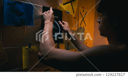 Man Putting Strange Notes On The Bathroom Walls 129227817