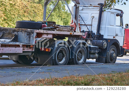 Truck tractor unit with empty trailer for transportation of large sized cargo 129228280