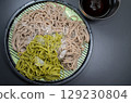 Uji tea soba and regular dried soba noodles served in a cold soba noodle dish. 129230804