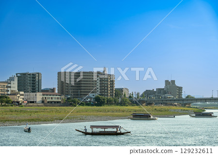 Gifu City, Gifu Prefecture: Boats preparing for cormorant fishing on the banks of the Nagara River Gifu City, Gifu Prefecture: Boats preparing for cormorant fishing on the banks of the Nagara River 129232611