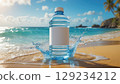 Refreshing Bottled Water on a Sandy Beach with Turquoise Sea and Clear Blue Sky Backdrop 129234212