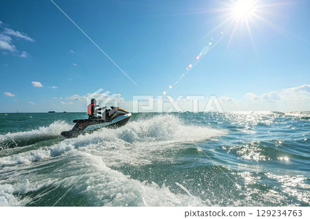 Jet Ski,aquabike,personal watercraft on the crest of a foamy turquoise wave 129234763