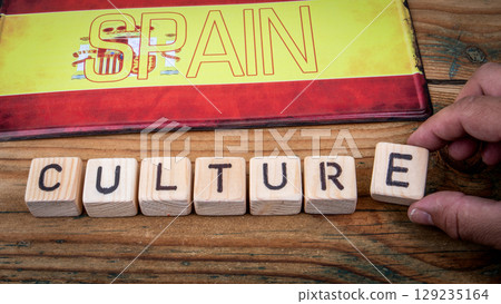 Spain Culture Concept with Wooden Blocks and National Flag Spain Culture Concept with Wooden Blocks and National Flag 129235164