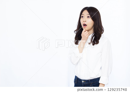 Surprised woman Surprised woman 129235748