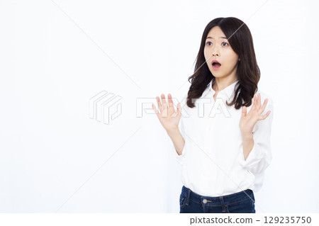 Surprised woman Surprised woman 129235750