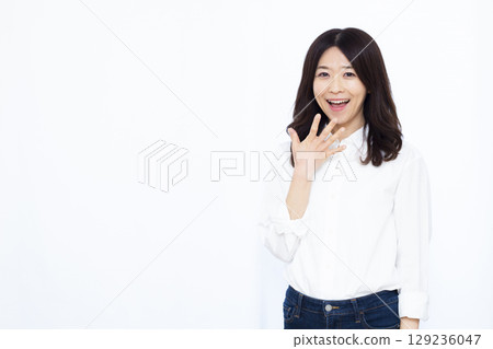 A woman smiling and surprised 129236047