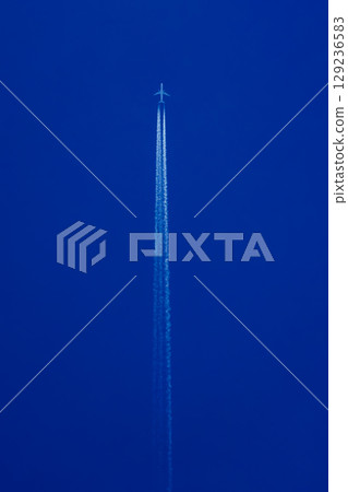 Airplane cloud in the blue sky 129236583