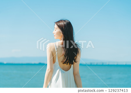 Image of young woman's UV care Image of young woman's UV care 129237413