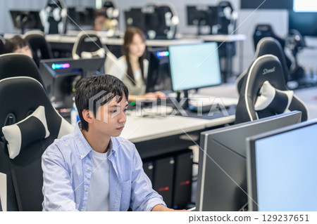 E-sports PC operation male student 129237651