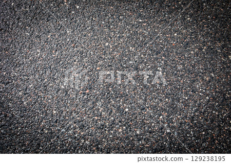 Close-Up Texture of Clean Asphalt Road Surface for Background or Design Template Close-Up Texture of Clean Asphalt Road Surface for Background or Design Template 129238195
