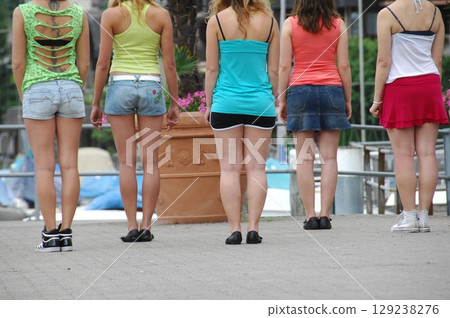 Rear view of white female model Rear view of white female model 129238276