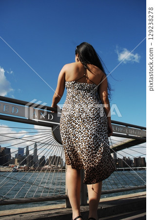 Rear view of white female model Rear view of white female model 129238278