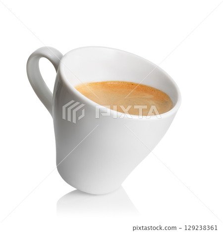 Small inclined espresso cup filled with freshly brewed coffee, featuring rich crema on top, isolated on white background Small inclined espresso cup filled with freshly brewed coffee, featuring rich crema on top, isolated on white background 129238361