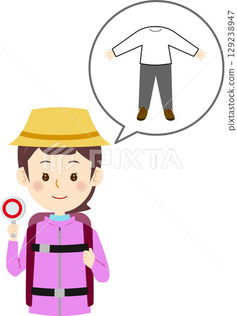 一個穿著戶外服裝的女人拿著 Maru 標籤 一個穿著戶外服裝的女人拿著 Maru 標籤 129238947