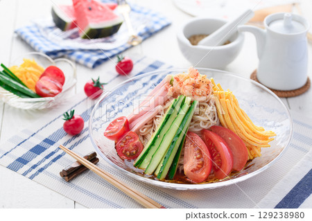 Cool and refreshing cold Chinese noodles served in summer, refreshing lunch, dining table image 129238980
