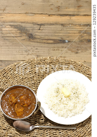 Chicken masala curry and butter rice Chicken masala curry and butter rice 129239435
