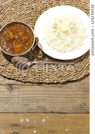 Chicken masala curry and butter rice Chicken masala curry and butter rice 129239436
