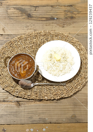 Chicken masala curry and butter rice Chicken masala curry and butter rice 129239437