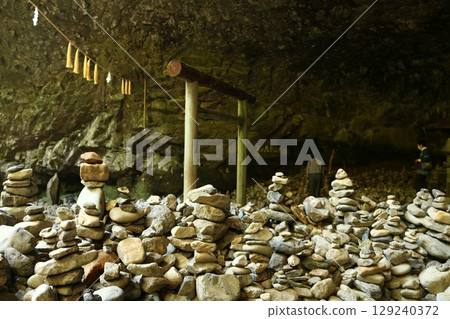 The stone tower of Amanoiwato Shrine, where prayers pile up The stone tower of Amanoiwato Shrine, where prayers pile up 129240372