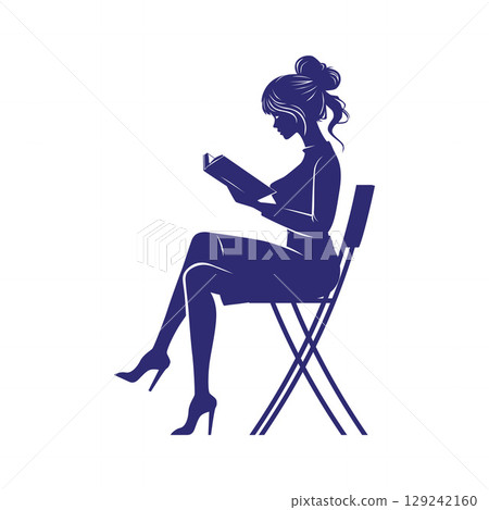 Girl Reading a Book Alone on Chair 129242160