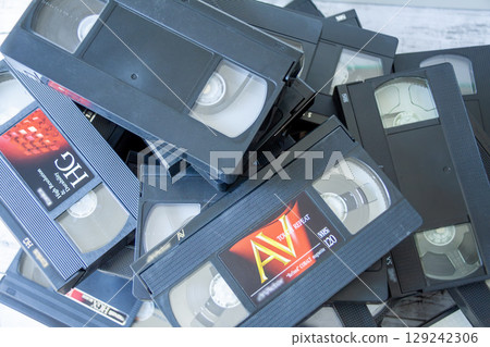 Piles of videotapes Piles of videotapes 129242306