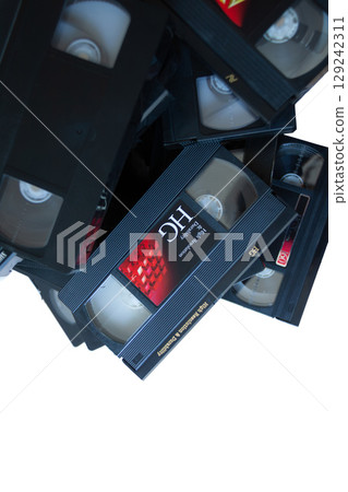 Piles of videotapes Piles of videotapes 129242311