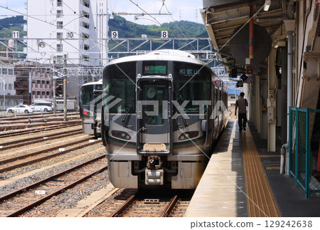 A 227 series train on the Wakayama Line stopping at Oji Station A 227 series train on the Wakayama Line stopping at Oji Station 129242638