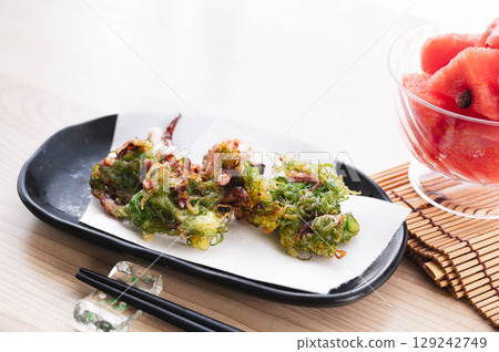 Deep-fried squid tentacles 129242749