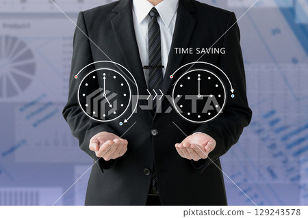 Businessman holding up a clock with reduced time 129243578