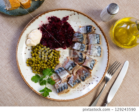 Appetizing cold smoked mackerel with peas and beets Appetizing cold smoked mackerel with peas and beets 129243590