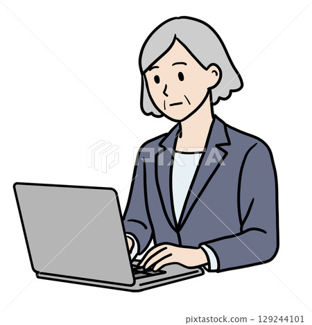 Serious senior woman working on a computer Serious senior woman working on a computer 129244101
