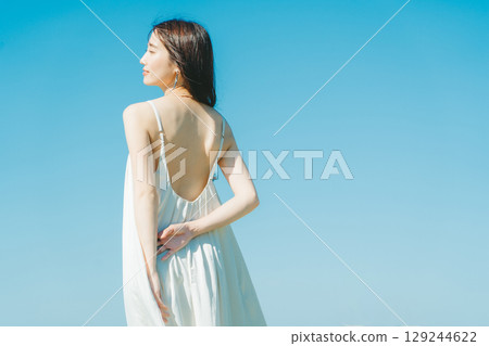 Image of young woman's UV care 129244622