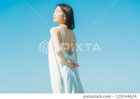 Image of young woman's UV care 129244624