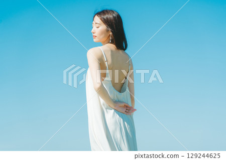 Image of young woman's UV care 129244625