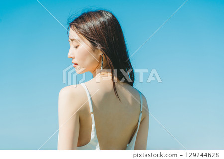 Image of young woman's UV care 129244628