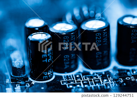 Abstract, Close up at electronic circuits, we see the technology of the mainboard, which is the important background of the computer.logic board,cpu motherboard,Main board,system board,mobo	 129244751