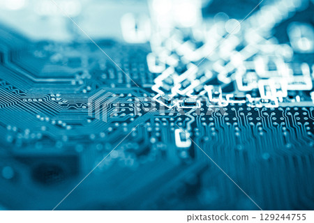 Abstract, Close up at electronic circuits, we see the technology of the mainboard, which is the important background of the computer.logic board,cpu motherboard,Main board,system board,mobo Abstract, Close up at electronic circuits, we see the technology of the mainboard, which is the important background of the computer.logic board,cpu motherboard,Main board,system board,mobo 129244755