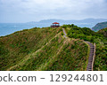 Jiufen Old Street is a narrow, winding alleyway with shops, teahouses, and restaurants that offers tourists a view of traditional Taiwanese life. 129244801