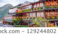Jiufen Old Street is a narrow, winding alleyway with shops, teahouses, and restaurants that offers tourists a view of traditional Taiwanese life. 129244802