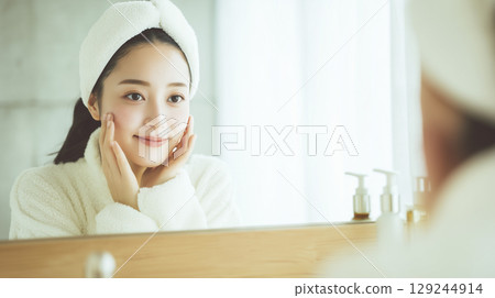 A young woman doing skin care 129244914