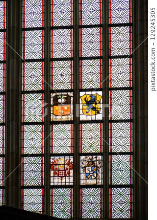 Stained glass windows of the Church of Saint Bavo Grote Kerk, Reformed Protestant church in Haarlem, Netherlands 129245305