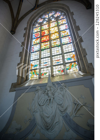 Stained glass windows of the Church of Saint Bavo Grote Kerk, Reformed Protestant church in Haarlem, Netherlands Stained glass windows of the Church of Saint Bavo Grote Kerk, Reformed Protestant church in Haarlem, Netherlands 129245310