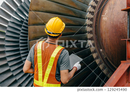 Professional Asian engineer male working service power plant turbine fan blade electrical generator 129245490