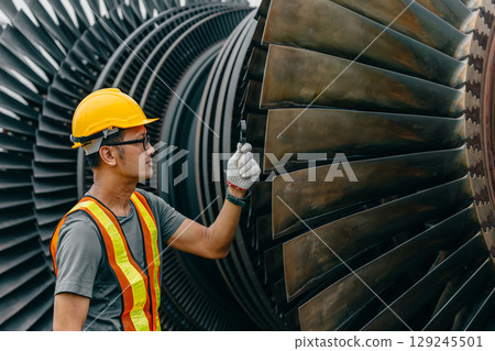 Professional Asian engineer male working service power plant turbine fan blade electrical generator 129245501